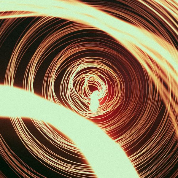 Abstract glowing lines symbolizing energy and flexibility.